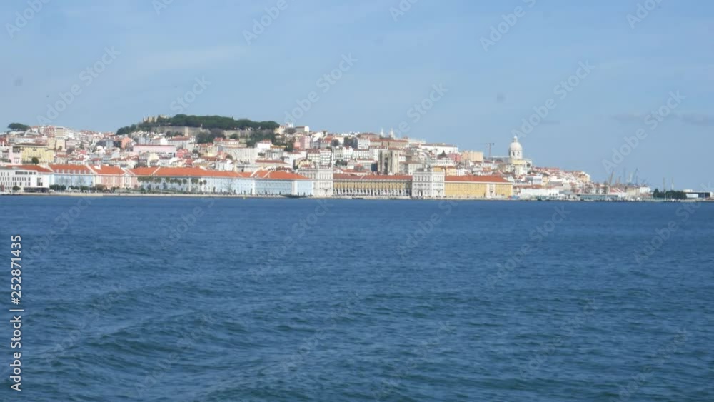 Lisbon old city center, POV view from ferry boat on Tagus River, Portugal Lisbon old city center, POV view from ferry boat on Tagus River, Portugal