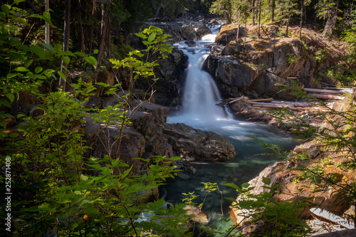 Konstfotografi The Ohanapecosh River cascades Silver Falls at Mount Rainier National Park, a wi