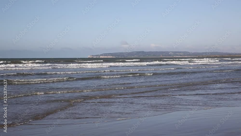 Camber Sands waves and beach East Sussex UK near Rye and Hastings Camber Sands waves and beach East Sussex UK near Rye and Hastings