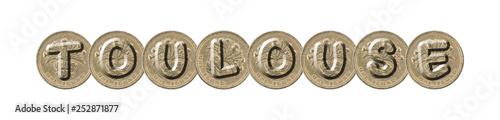 TOULOUSE  word with British coins on white background