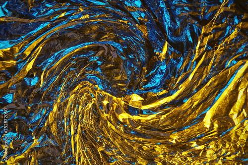 abstract background metal aluminum foil blue and yellow gold color