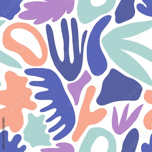 Creative seamless pattern with natural shapes or marks and jungle leaves on w...