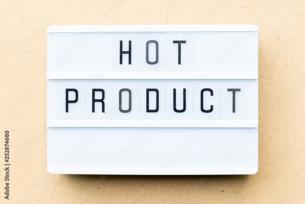White lightbox with word hot product on wood background White lightbox with word hot product on wood background