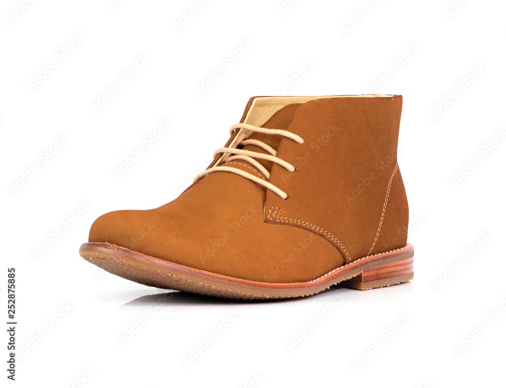 Men’s brown ankle boots with nubuck leather isolated on a white background. Men’s brown ankle boots with nubuck leather isolated on a white background.