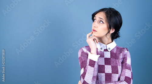 pensive girl looking up