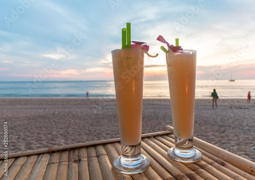 Two Pina Colada's on Long Beach,Koh Lanta, Thailand. February 2019. photo