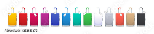 Colorful set of modern plastic suitcases with wheels, retractable handle and luggage tag label on suitcase with country code and barcode. Polycarbonate suitcases isolated on white.