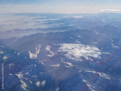 Flying Above the clouds and mountains