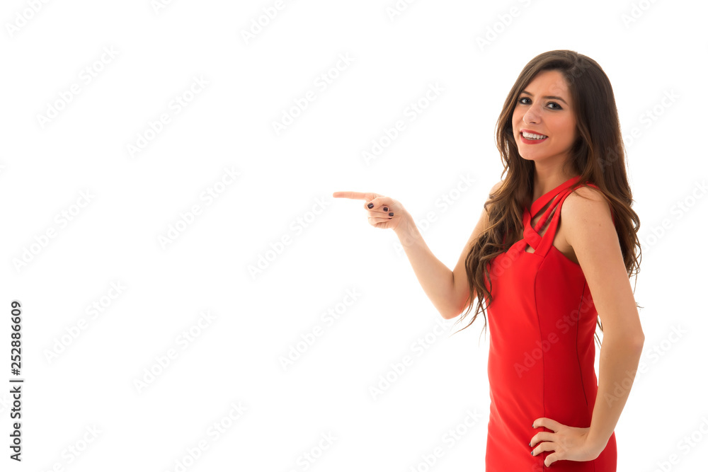 Happy woman pointing to the copy space Happy woman pointing to the copy space