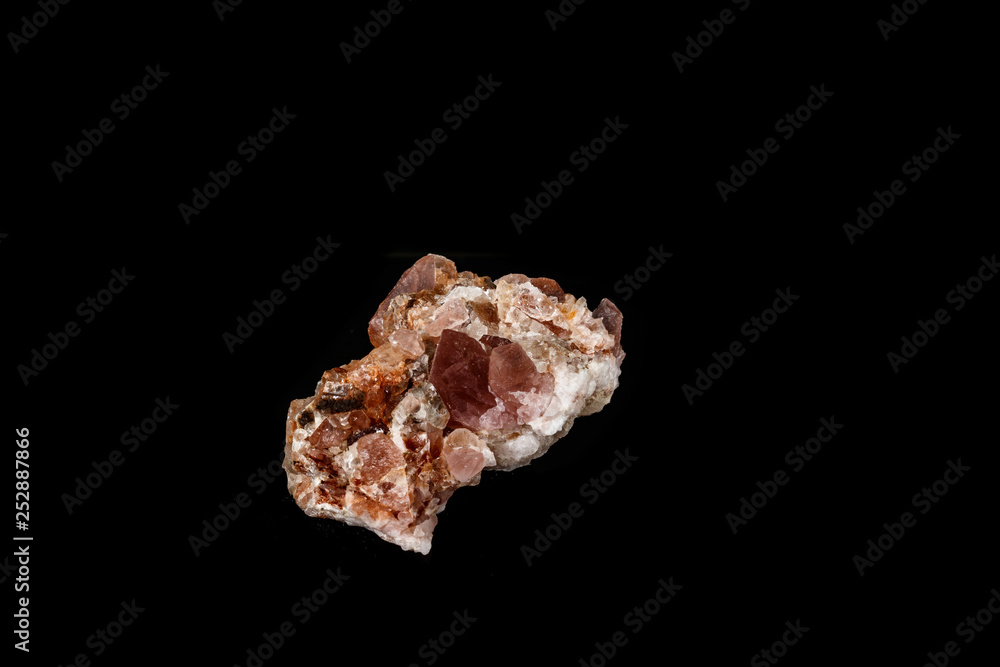 Macro mineral stone Pink Amethyst on a black background Macro mineral stone Pink Amethyst on a black background