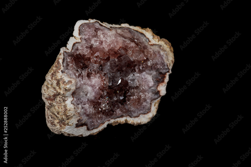 Macro mineral stone Pink Amethyst on a black background Macro mineral stone Pink Amethyst on a black background