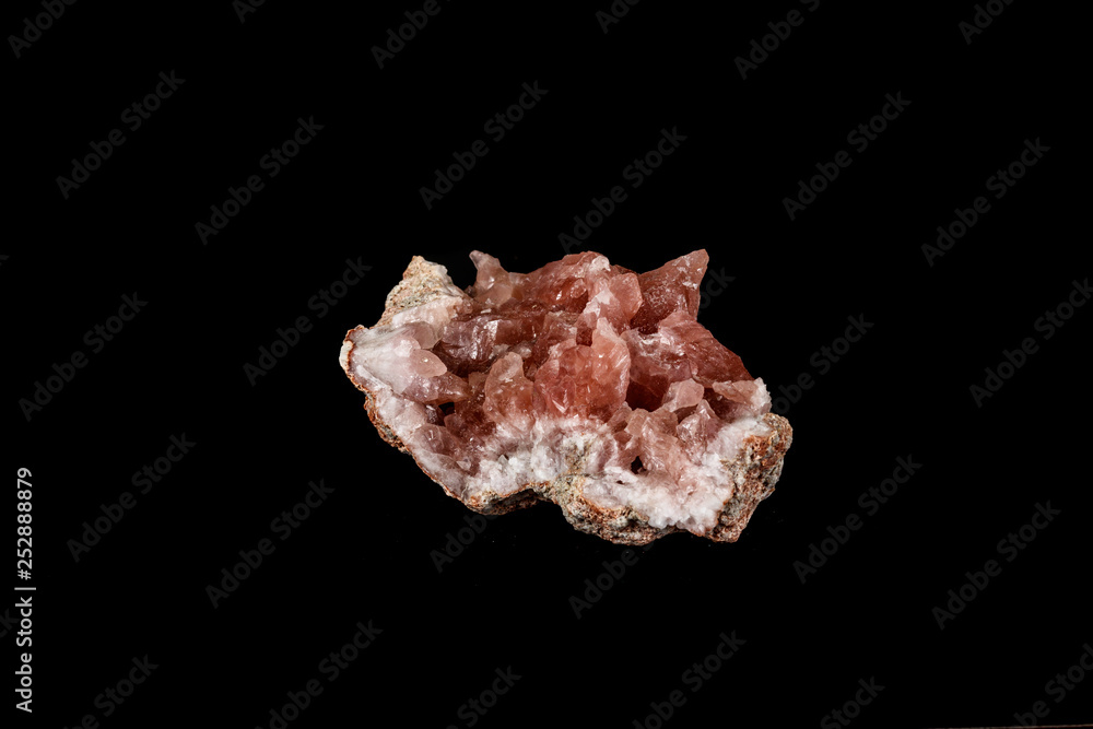 Macro mineral stone Pink Amethyst on a black background Macro mineral stone Pink Amethyst on a black background