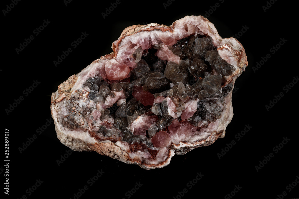 Macro mineral stone Pink Amethyst on a black background Macro mineral stone Pink Amethyst on a black background