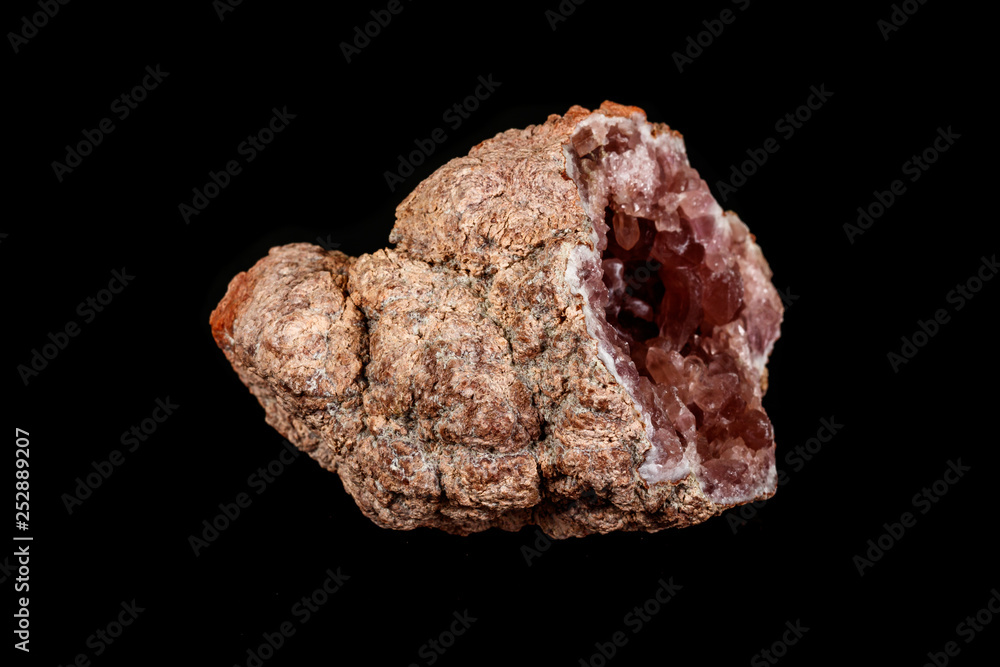 Macro mineral stone Pink Amethyst on a black background Macro mineral stone Pink Amethyst on a black background