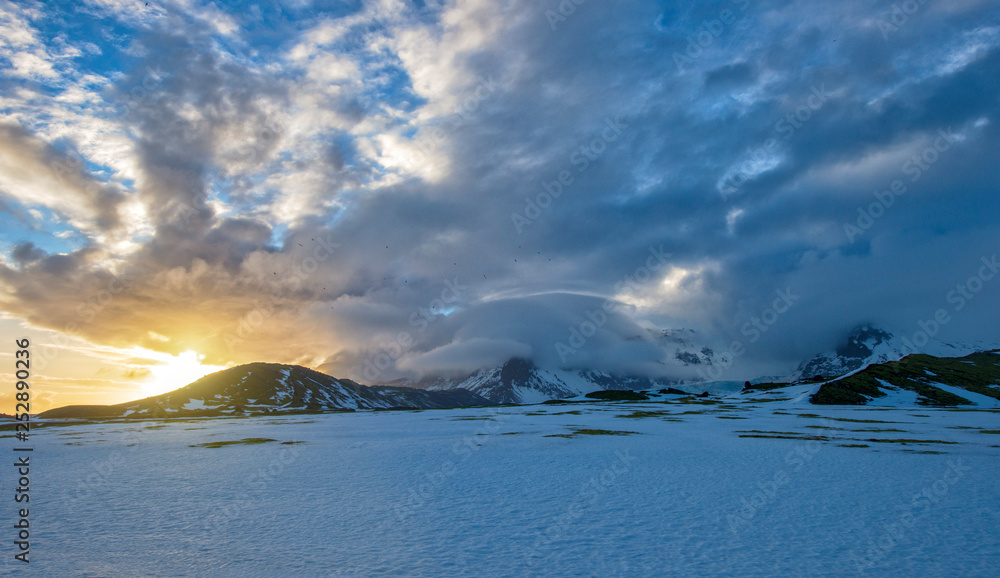 sunset in an icy Icelandic landscape