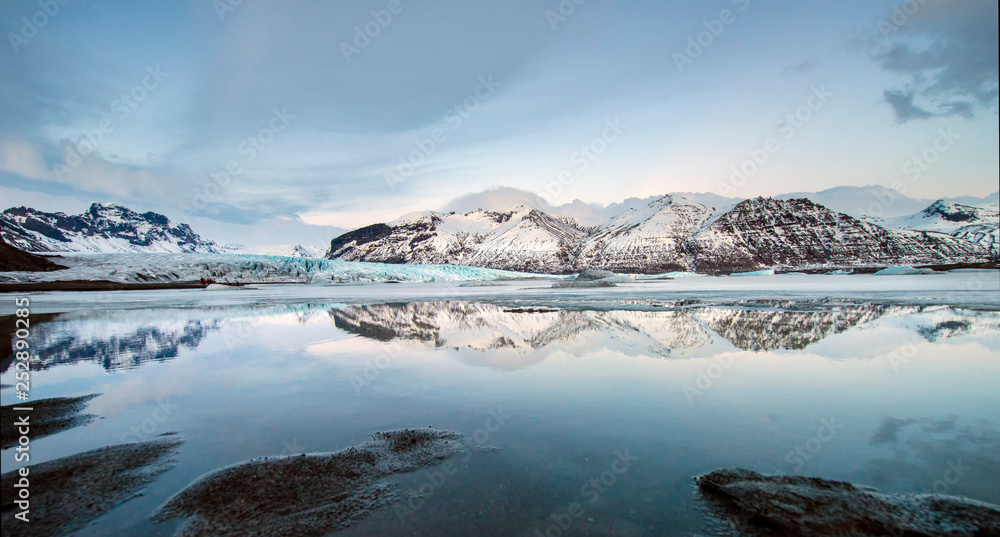 glacial and mountain reflected in the water
