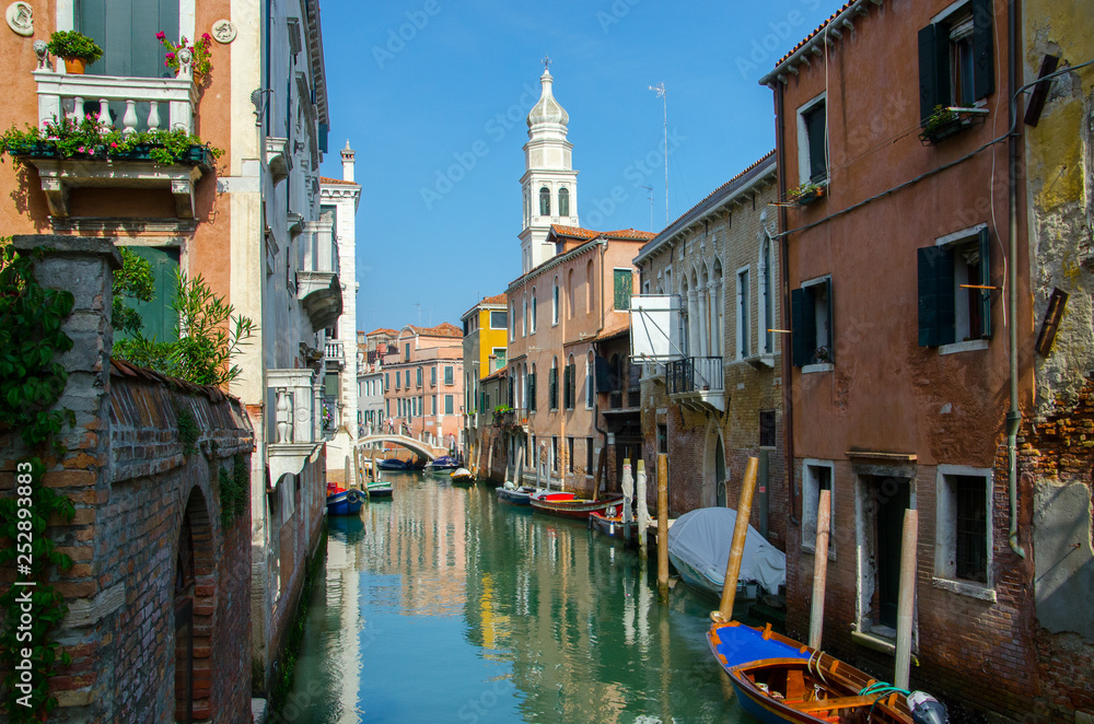 The canal in Venice, sky reflection in water