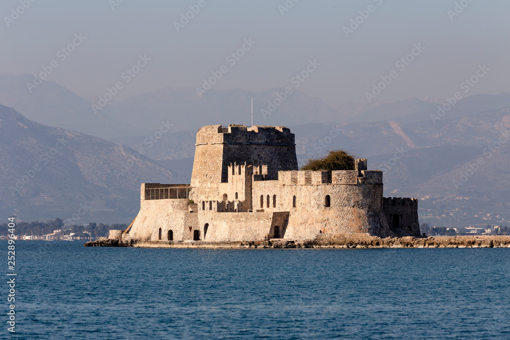 Sea, stone, Venetian fortress in the city Nafplio (Greece, Peloponnese)