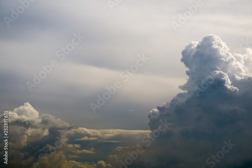 storm silhouette heap cloud sun ray in gray skyscape dark cloud