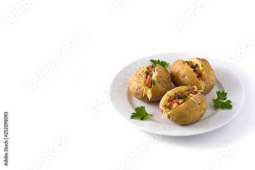 Stuffed potatoes with bacon and cheese on plate isolated on white background. Copyspace