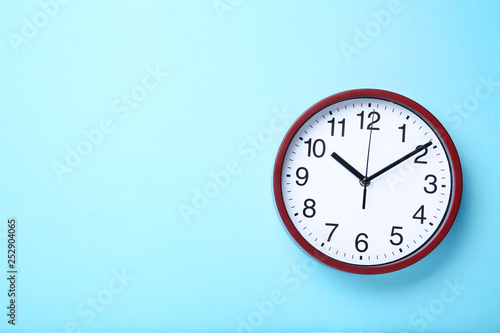 Wallpaper Mural Round clock on blue background Torontodigital.ca