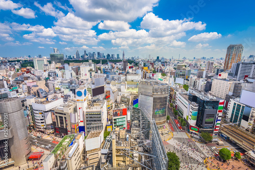 Shibuya, Tokyo, Japan city skyline over Shibuya Scramble Crosswalk