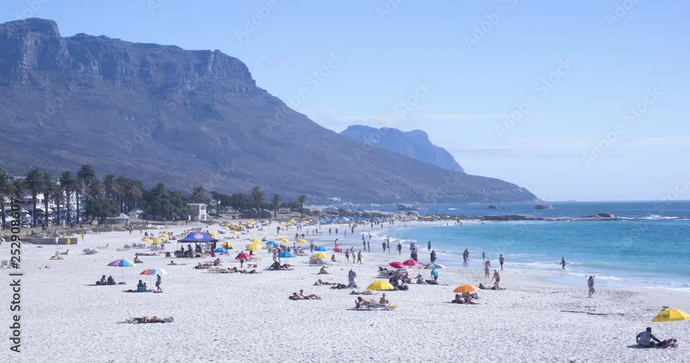 Colorful time lapse of busy beach in Camps Bay Capetown Colorful time lapse of busy beach in Camps Bay Capetown