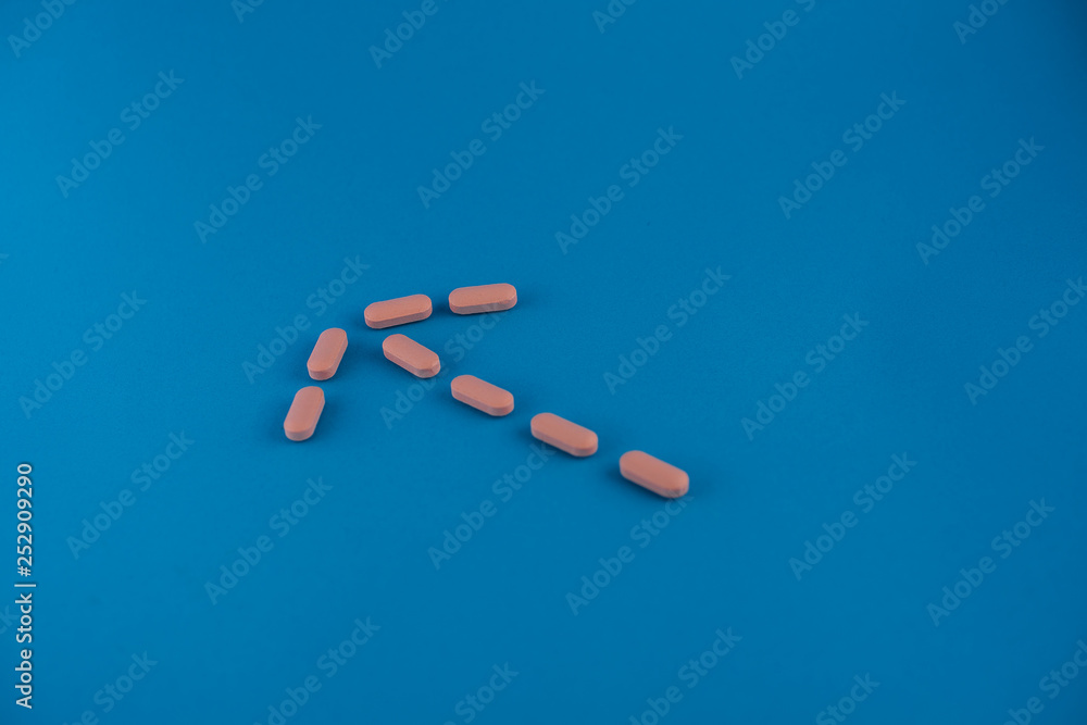 pills in blue background pills in blue background