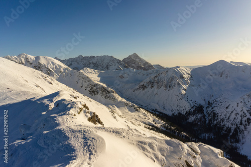 Big snow-capped peaks of the Tatra Mountains on a sunny day. © Jacek Jacobi