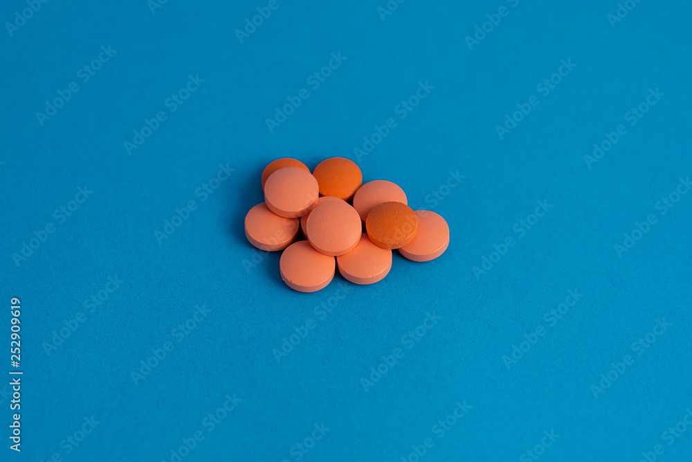pills in blue background
