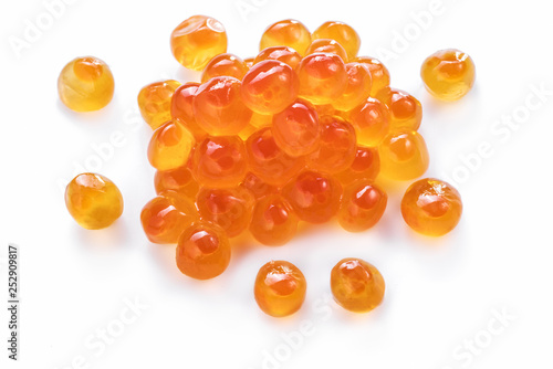 Red caviar or fish roe eggs on white background.  Clipping path.