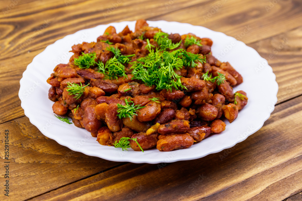 Traditional georgian kidney beans dish lobio on wooden table Traditional georgian kidney beans dish lobio on wooden table