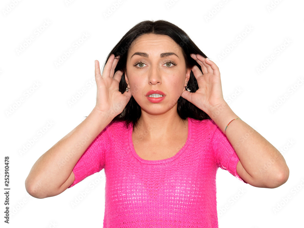 Portrait of beautiful young brunette woman covering her ears wit Portrait of beautiful young brunette woman covering her ears wit