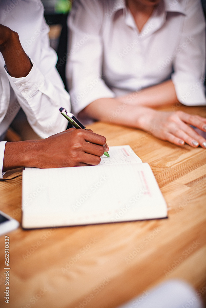 Successful team at work. Group of young business people Successful team at work. Group of young business people