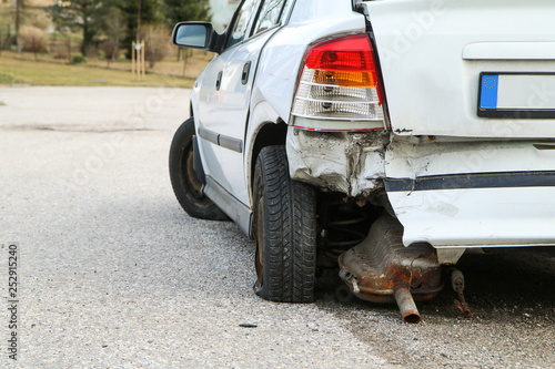 A car destroyed during the traffic accident. The car is abandoned and stands by the road.