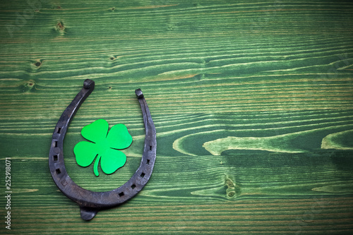St. Patricks day, lucky charms on green wooden background