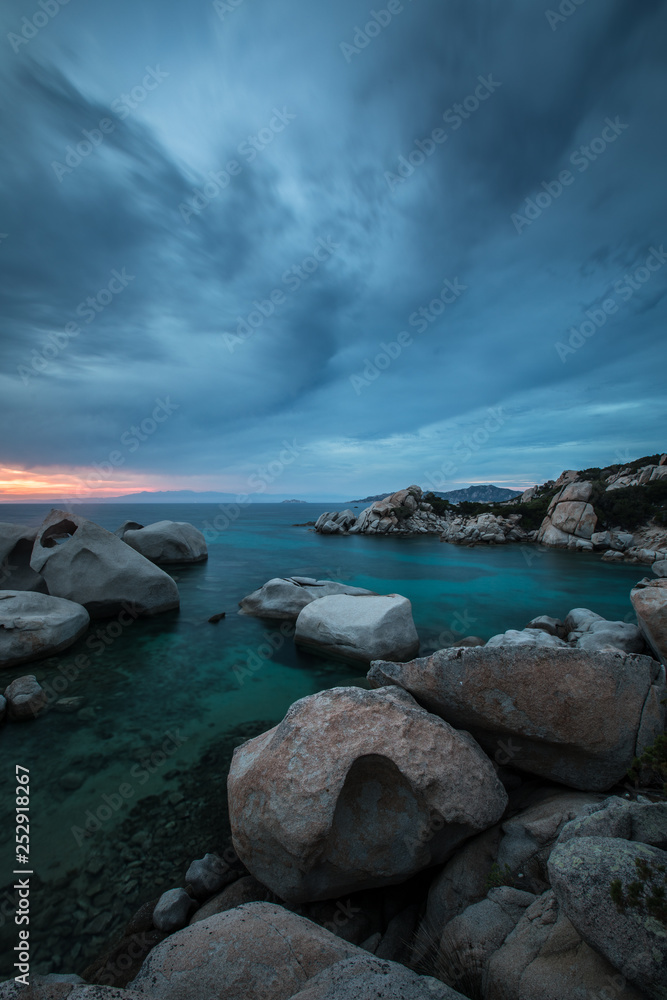 Scenic Sardinia island landscape. Italy sea ​​coast with azure clear water. Nature background - long exposure image