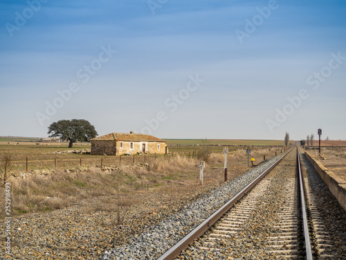 Rural landscape of a railway track and a small railway station
