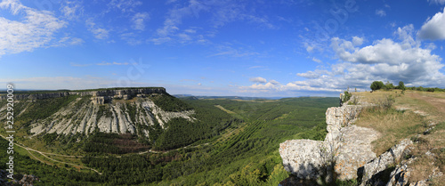 From the height of the plateau Chufut-Kale in the Crimea, a beautiful panorama of the valley and the neighboring mountain of a similar structure