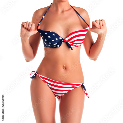 Woman in bikini with USA flag print  isolated on white background