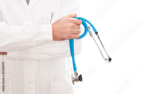Doctor In White Coat With A Stethoscope Crosses His Arms