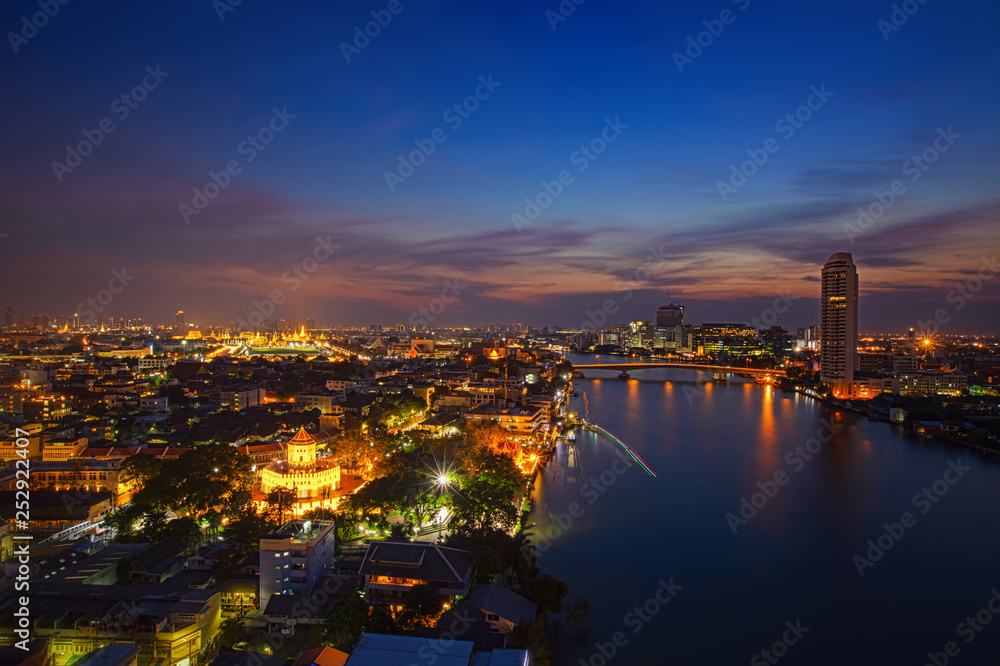 Fototapeta premium Bangkok City Scape, Thailand night. Panorama of Chao Praya River in Bangkok. View of phra Sumen fort with grand Palace and Emerald budha temple in the background, Bangkok Thailand. 13 January 2019