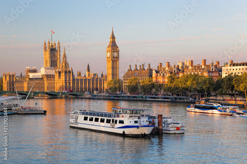 Photography Big Ben and Houses of Parliament with boat in London, England, UK