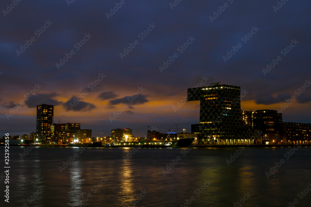 Beautiful view of the city center of Rotterdam. Erasmus bridge over the river Meuse. Rotterdam city center in the evening. ROTTERDAM, HOLLAND.