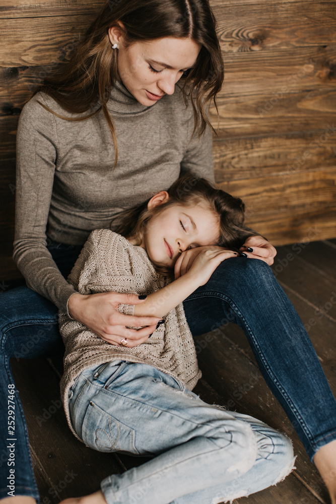 beautiful young mother care of her daughter beautiful young mother care of her daughter