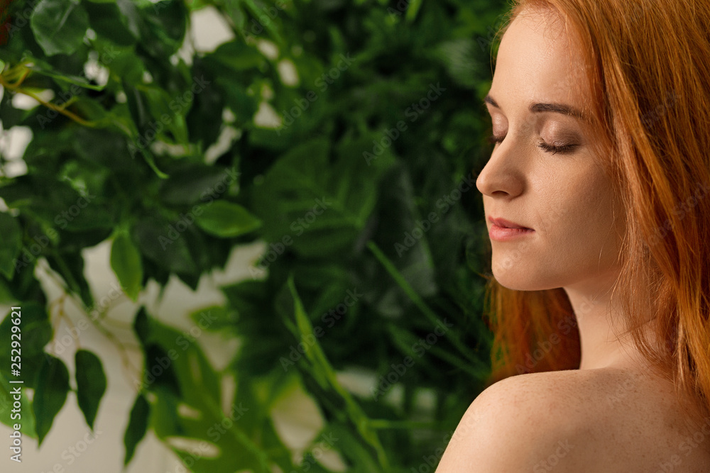 Nude tender gentle red-haired girl with closed eyes Nude tender gentle red-haired girl with closed eyes
