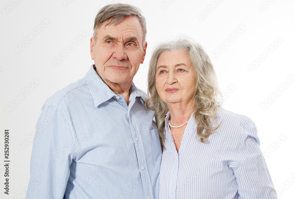 Happy senior family couple isolated on white background. Close up portrait woman and man with wrinkled face. Elderly grandparents people have fun. Smiling mature male and female. Copy space Happy senior family couple isolated on white background. Close up portrait woman and man with wrinkled face. Elderly grandparents people have fun. Smiling mature male and female. Copy space