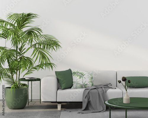 Interior with white sofa and green pillows