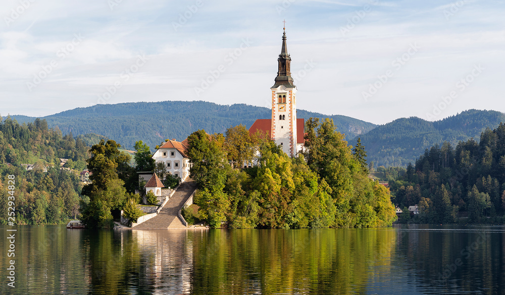 Church of the assumption of Mary in the island of Bled lake, Slovenia, with reflects in the water