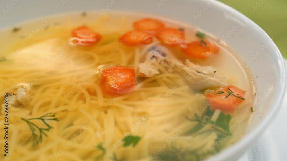 Macro view: The chicken bouillon. Soup. 4k Macro view: The chicken bouillon. Soup. 4k